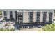 Full exterior view of a multi-story apartment building with ample parking at 2901 26Th W St # 317, Bradenton, FL 34205