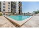 Beautiful community pool, with lounge chairs and umbrellas, is the perfect place to relax and unwind at 2901 26Th W St # 317, Bradenton, FL 34205