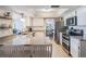 Modern kitchen boasting granite countertops, stainless steel appliances, and a layout ideal for cooking and gathering at 34 Hickory Ln, Safety Harbor, FL 34695