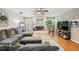 Comfortable living room includes a fireplace, stylish decor, and ample seating for relaxation at 34 Hickory Ln, Safety Harbor, FL 34695