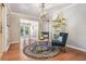 Cozy living room showcasing comfortable seating, a stylish rug, and an airy atmosphere for relaxation and socializing at 34 Hickory Ln, Safety Harbor, FL 34695
