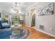 Inviting living space with views of the dining area, stainless steel appliances, and ample natural light at 34 Hickory Ln, Safety Harbor, FL 34695