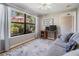 Cozy room with a large window overlooking the private backyard at 34 Hickory Ln, Safety Harbor, FL 34695
