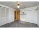 Bright bedroom features white walls, gray carpet, a closet, and an entrance at 3706 Cambridge St, New Port Richey, FL 34652