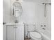 Bright bathroom featuring a sink vanity with white cabinets, tile walls, and a shower over tub at 4015 Bayshore Blvd # 8E, Tampa, FL 33611