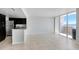 Bright and airy living room with tile floors and a sliding glass door at 4015 Bayshore Blvd # 8E, Tampa, FL 33611