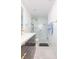 Modern bathroom with a glass-enclosed shower, sleek vanity, and elegant fixtures at 4644 Bay Crest Dr, Tampa, FL 33615