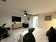 Relaxing main bedroom with a king bed, ceiling fan, and view of ensuite at 4644 Bay Crest Dr, Tampa, FL 33615