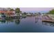 Waterfront view showcasing multiple docks and boat slips along a tranquil canal at 4644 Bay Crest Dr, Tampa, FL 33615