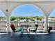 Inviting balcony with seating, offering a peaceful outdoor space with a scenic neighborhood view at 5501 80Th N St # 509, St Petersburg, FL 33709