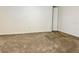 Cozy bedroom with plush carpet and neutral walls, ready for personal touches at 5501 80Th N St # 509, St Petersburg, FL 33709