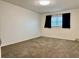 Clean bedroom featuring plush carpeting, neutral paint and a window at 5501 80Th N St # 509, St Petersburg, FL 33709