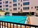 Beautiful community swimming pool and manicured landscaping with plenty of space to relax and enjoy the sunshine at 5501 80Th N St # 509, St Petersburg, FL 33709