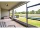 Spacious screened-in lanai offering a tranquil outdoor living space at 5710 Grand Sonata Ave, Lutz, FL 33558