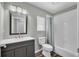 Stylish bathroom with a modern vanity, sleek mirror, and a shower-tub combination at 6203 34Th E Ct, Ellenton, FL 34222