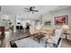 Open-concept living room flows into kitchen, creating an inviting space for entertaining and Gathering time at 6203 34Th E Ct, Ellenton, FL 34222