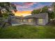 Inviting backyard features a screened-in pool and patio area perfect for entertaining at 6501 Appaloosa Dr, Tampa, FL 33625