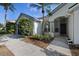 Well-maintained front exterior with a neat lawn, tidy landscaping, and a welcoming entrance at 6501 Appaloosa Dr, Tampa, FL 33625