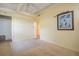 Neutral carpeted bedroom with ample closet space and natural light at 712 Sunset Cv, Madeira Beach, FL 33708
