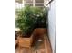 Outdoor shower with brick floor and tropical plants offers a private, refreshing experience at 712 Sunset Cv, Madeira Beach, FL 33708