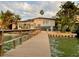 Charming waterfront home with a private dock, offering stunning water views and direct access to the bay at 712 Sunset Cv, Madeira Beach, FL 33708