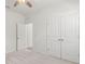 Bedroom with carpet and closet at 7139 Steer Blade Dr, Zephyrhills, FL 33541