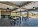 Community picnic pavilion offers seating for neighborhood gatherings near an outdoor playground with modern ceiling fans at 7139 Steer Blade Dr, Zephyrhills, FL 33541