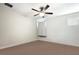 Empty bedroom with neutral colors, a ceiling fan, and a window at 8226 Summer Brook Ct, Land O Lakes, FL 34638