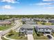Beautiful two-story home with a well-manicured lawn, two car garage, and dark shutters at 8226 Summer Brook Ct, Land O Lakes, FL 34638