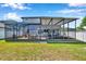 Expansive screened patio for outdoor living, dining, and entertaining at 8226 Summer Brook Ct, Land O Lakes, FL 34638