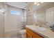 Standard bathroom featuring a tub/shower, vanity, and mirror at 8429 Hunters Fork Loop, Ruskin, FL 33573