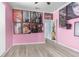Spacious bedroom adorned with celebrity wall art and complemented by modern flooring at 8604 Vicksburg Rd, Spring Hill, FL 34608