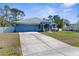 Charming single-story home features a well-maintained lawn and a spacious two-car garage at 8604 Vicksburg Rd, Spring Hill, FL 34608