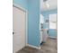 This cozy laundry room with modern machines and ample storage space makes laundry day a breeze at 8604 Vicksburg Rd, Spring Hill, FL 34608