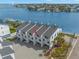 Waterfront townhouses with private docks, garages, and convenient access to the bay and gulf at 9901 1St E St # D, Treasure Island, FL 33706