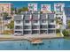 Townhome boasts private docks, balconies, and a modern design providing the ultimate waterfront lifestyle at 9901 1St E St # D, Treasure Island, FL 33706