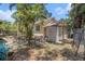 Backyard featuring a storage shed and mature landscaping at 11101 Corlett Rd, Riverview, FL 33578