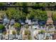 Aerial view of the neighborhood with tree-lined streets and neatly arranged homes, creating a sense of community at 10137 Oleander Dr, Port Richey, FL 34668