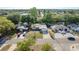 Aerial view of a home in a quiet residential neighborhood with mature trees and well-maintained streets at 10137 Oleander Dr, Port Richey, FL 34668