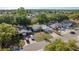 Charming neighborhood aerial view, showcasing the property's location amidst lush greenery and neighboring homes at 10137 Oleander Dr, Port Richey, FL 34668