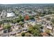 Residential area with houses, trees, and nearby pond creating a tranquil, suburban setting at 10137 Oleander Dr, Port Richey, FL 34668