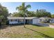 Charming single-Gathering home with a well-maintained lawn and inviting curb appeal at 10137 Oleander Dr, Port Richey, FL 34668