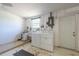 Spacious laundry room with washer and dryer hookups and storage at 10137 Oleander Dr, Port Richey, FL 34668