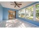 This sunroom is full of light and overlooks the backyard at 10137 Oleander Dr, Port Richey, FL 34668