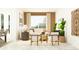 Inviting living room with stylish decor, comfortable seating, and ample natural light at 10240 Trumpet Honeysuckle Way, San Antonio, FL 33576