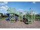 Neighborhood playground features colorful slides and climbing equipment at 10240 Trumpet Honeysuckle Way, San Antonio, FL 33576