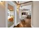 Open dining room with hardwood floors overlooks the outdoor patio at 10509 Broadland Pass, Thonotosassa, FL 33592