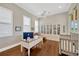 Spacious home office with built-in bookshelves and lots of natural light at 10509 Broadland Pass, Thonotosassa, FL 33592