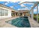 Beautiful backyard pool area with a screened lanai and plenty of patio space at 10509 Broadland Pass, Thonotosassa, FL 33592