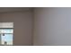 Bright bedroom with window and blinds offers ample natural light, showcasing a blank canvas at 10708 Oak Bend Dr, Parrish, FL 34219